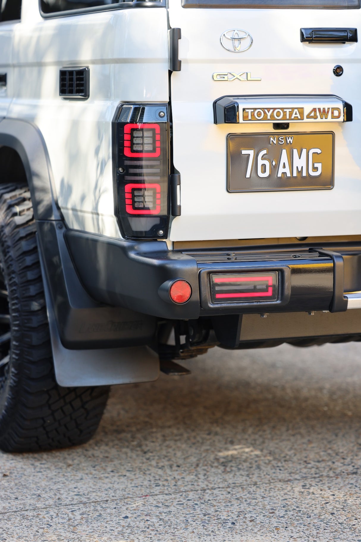 Smoked Halo LED Tail Lights + Rear Bar Lights Plug n Play installed in 70 Series LandCruiser | PVS Automotive