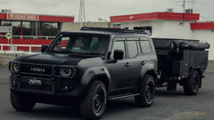 Black 250 Series LandCruiser Prado towing an off road camper trailer