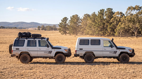 A 76 Series wagon and a longer 78 Series Troopcarrier in side profile, showing the wheelbase difference