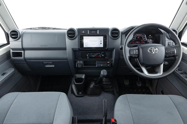Factory dashboard of the facelift Toyota LandCruiser 70 Series with the standard 6.7-inch multimedia unit