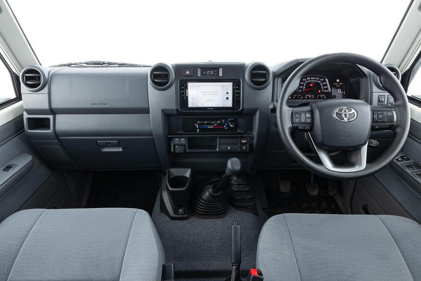 Factory dashboard of the facelift Toyota LandCruiser 70 Series with the standard 6.7-inch multimedia unit