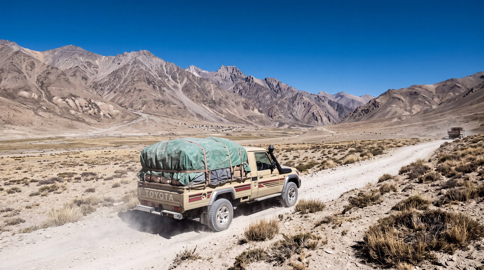 A LandCruiser 70 Series ute working on an arid high altitude plateau outside Australia
