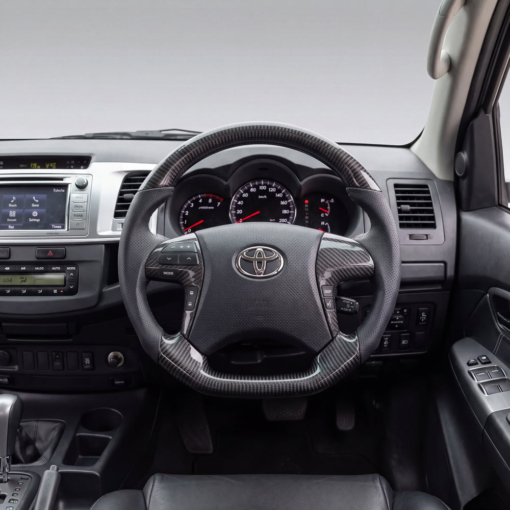 Classic Carbon with Perforated Leather Sides Steering Wheel to suit Toyota Hilux N70 Facelift (06/2011-04/2015)