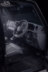Leather dashboard and steering wheel in a Toyota 70 Series LandCruiser
