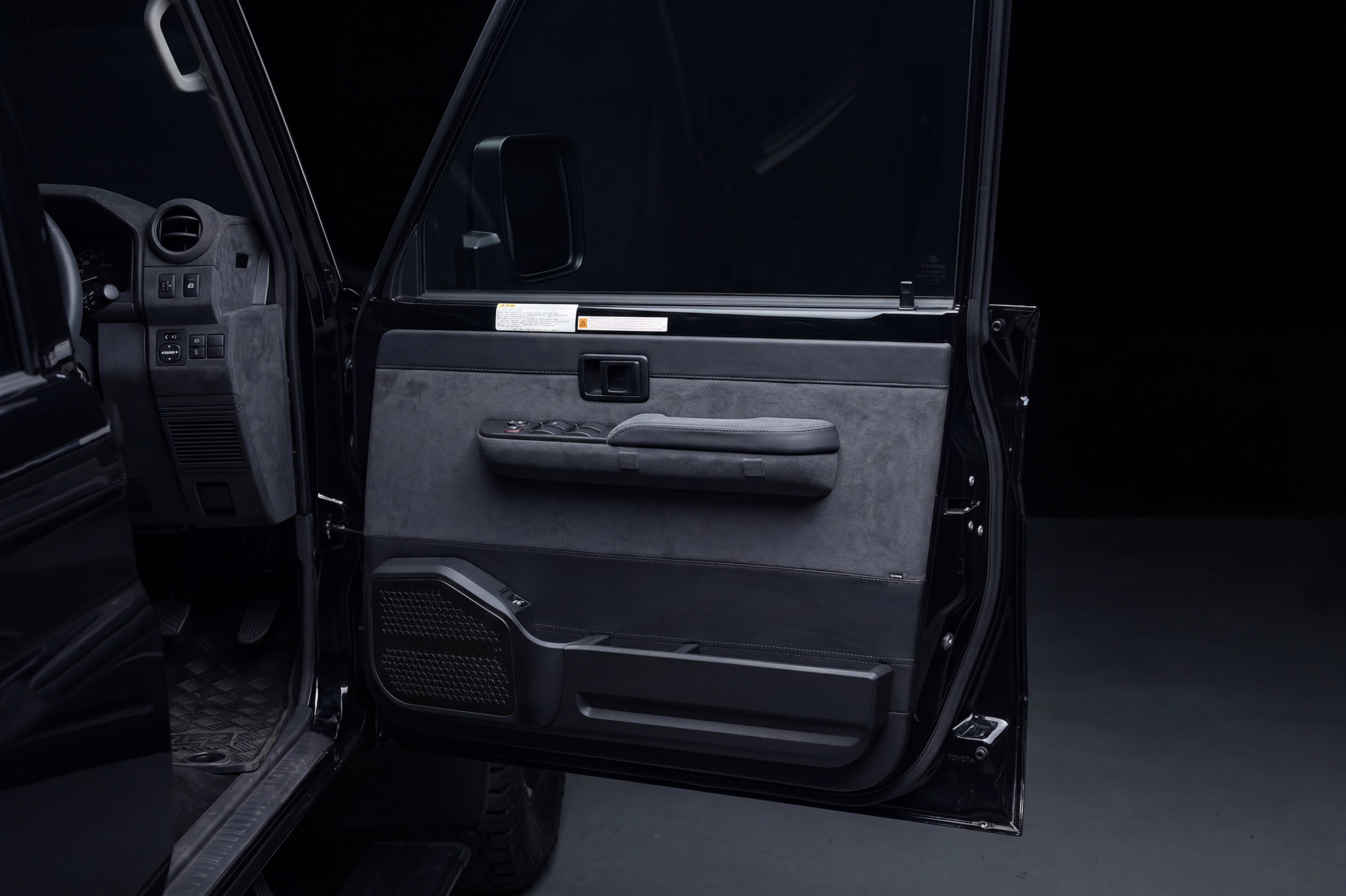 Front door open Alcantara card facing camera