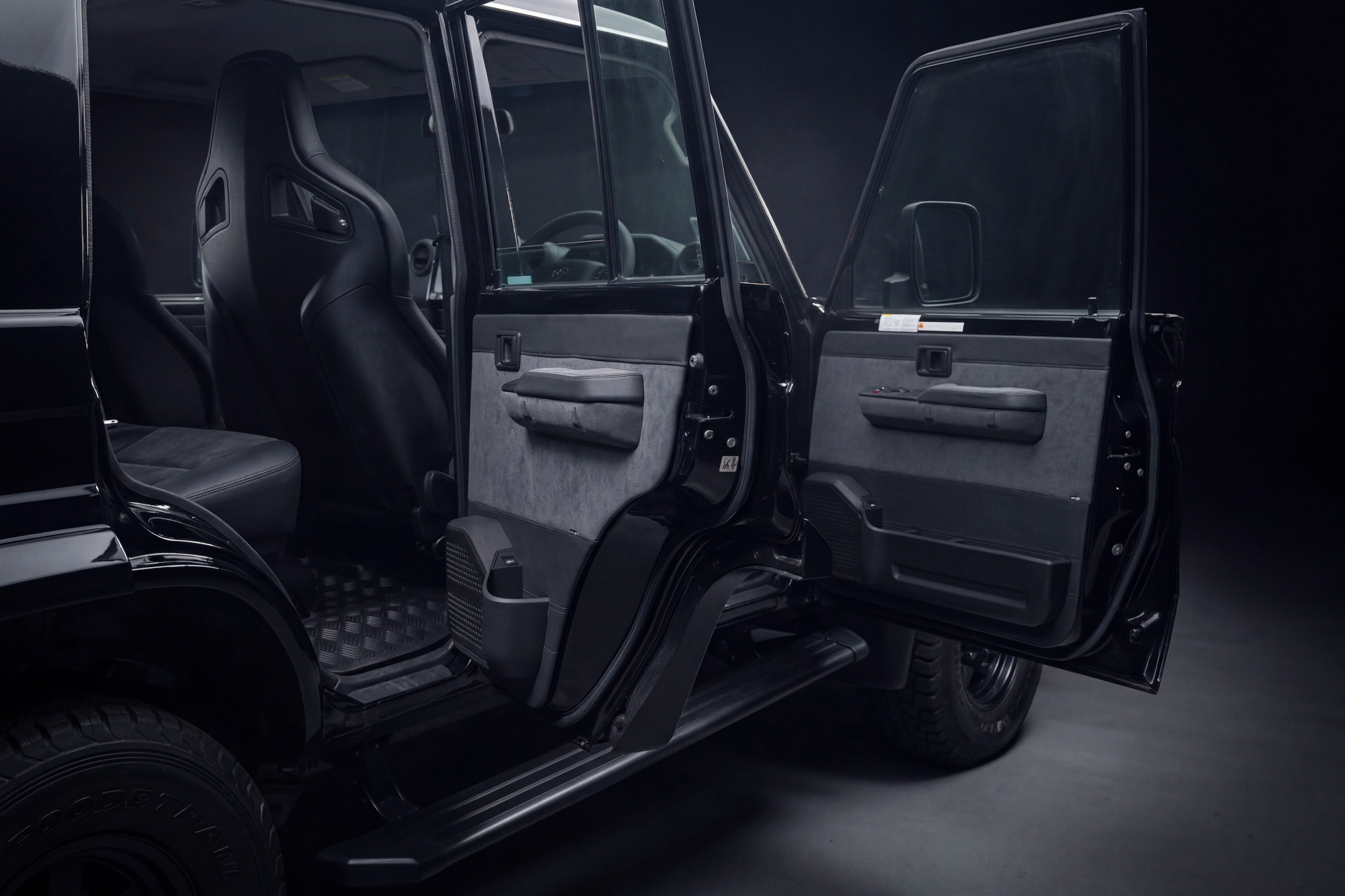 Both driver doors open dramatic