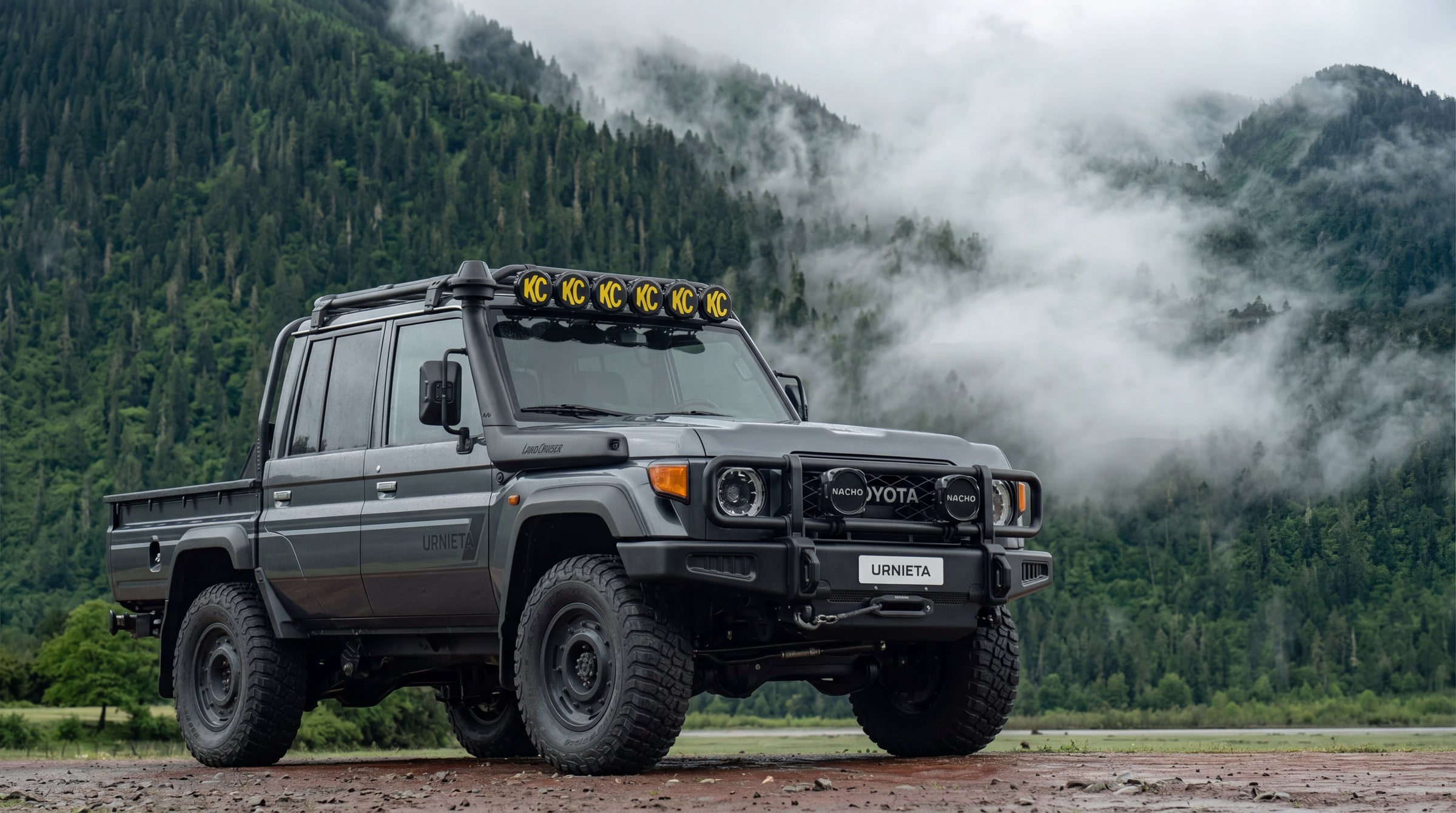 LandCruiser 79 Series with Urnieta exo cage and roof rack in the mountains