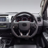 PVS 300 Series style steering wheel upgrade kit for the Toyota Hilux N70, traditional carbon with black leather