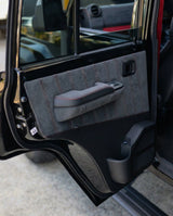 THE GOVNER 79 Series build: custom door card and armrest in black Alcantara with red stitching