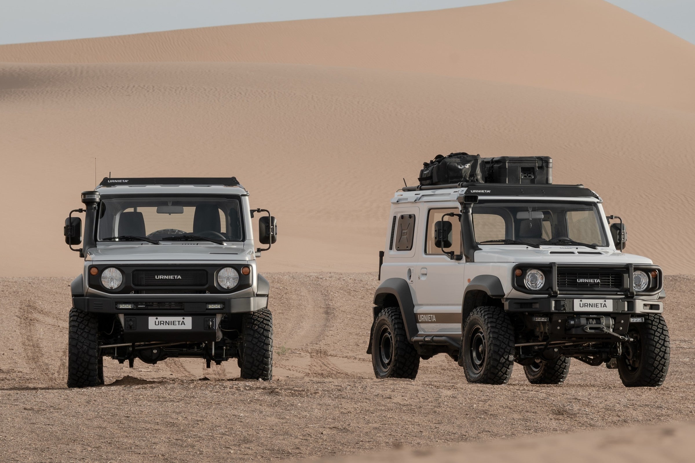Two Suzuki Jimny builds with Urnieta SALADO and 1970 kits on a sand dune